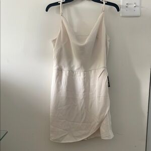 Elegant Cream scorts mini dress… NWT never worn